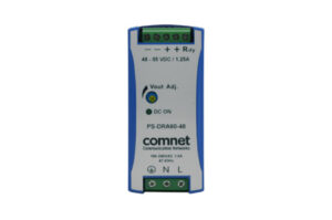 Elektronisches Gerät mit der Aufschrift „Comnet PS-DRA60-48“, ein Stromversorgungsteil mit 48-55 VDC bei 1,25 A, Anschlüsse oben und unten sichtbar.