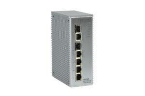 Ein silberner, industrieller 5-Port-Gigabit-Ethernet-Switch von ComNet mit rechteckigem Gehäuse und mehreren Ethernet-Anschlüssen auf der Vorderseite.