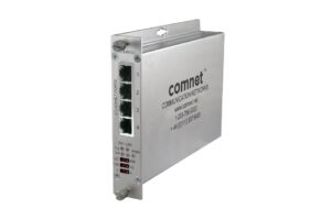 Ein silberner Netzwerk-Switch von ComNet mit vier Ethernet-Ports und LED-Anzeigen auf der Vorderseite.