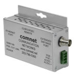 Ein silberner Ethernet-Extender von ComNet mit verschiedenen Anschlüssen und Ports, einschließlich eines Ethernet-Ports und eines erweiterten Distanzports.