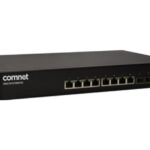 Ein schwarzer Netzwerk-Switch von Comnet mit mehreren Ethernet-Ports auf der Vorderseite.