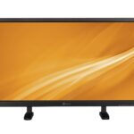 Ein schwarzer Computerbildschirm mit einem orangefarbenen Hintergrund und abstrakten Linienmuster.