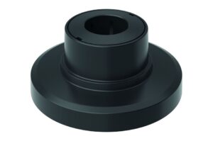 Schwarzes zylindrisches Bauteil mit breitem Sockel und vertikaler Öffnung oben.