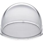 Eine transparente Abdeckhaube aus Kunststoff auf einem flachen Teller.