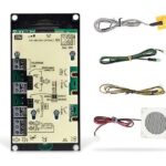Elektronische Leiterplatte mit verschiedenen Anschlussdrähten und einem Lautsprecher.