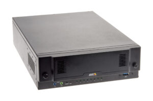 Ein schwarzes elektronisches Gerät in Form eines Quaders mit mehreren Anschlüssen und Lichtern an der Vorderseite.