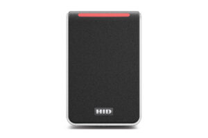 Ein schwarzer RFID-Kartenleser mit einer roten LED-Anzeige an der Oberseite und dem "HID"-Logo unten.