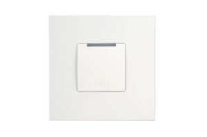 Ein weißer Zugangskartenleser mit der Aufschrift "HID" in der Mitte des Geräts.