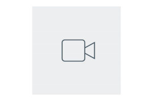 Ein minimalistisches Symbol einer Videokamera auf grauem Hintergrund.