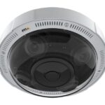 Überwachungskamera in einem runden, weißen Gehäuse mit abgedunkeltem Sichtfenster.