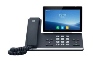 Ein modernes Tischtelefon mit großem Display und Zifferntastatur.