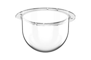 Eine transparente, halbkugelförmige Plastikschüssel mit einem breiten Rand.
