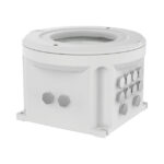 Ein weißer, zylindrischer technischer Behälter mit mehreren sechseckigen Stöpseln an der Seite und einer durchsichtigen Abdeckung oben.