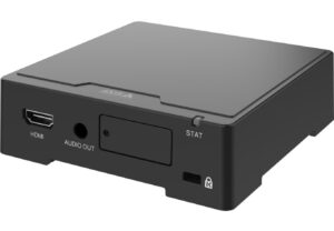 Ein schwarzes elektronisches Gerät mit HDMI- und Audioausgangsanschluss, und einer STAT-LED.