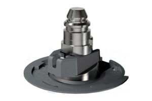 Ein mechanisches Teil aus Metall und Kunststoff mit einem komplexen Design, das auf einem runden Sockel montiert ist.