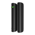 Zwei schwarze, zylindrische Objekte mit einem grünen Licht auf der Vorderseite.