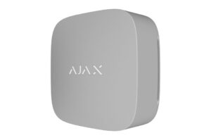 Ein rechteckiges, graues Gerät mit abgerundeten Kanten und dem Schriftzug "AJAX" auf der Vorderseite.