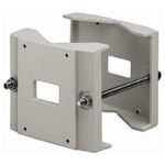 Graues, quadratisches Montageset mit Befestigungsschrauben und Löchern.