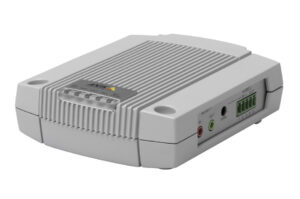 Ein graues elektronisches Gerät mit Eingangs- und Ausgangsanschlüssen für Audio, LEDs und einem Logo.