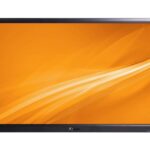 Monitor mit schwarzem Rahmen und orangefarbenem Bildschirmhintergrund mit geschwungenen Linien.