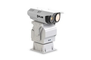 Eine weiße FLIR-Wärmebildkamera mit robustem Standfuß und Doppellinsen, ideal für Überwachungszwecke.