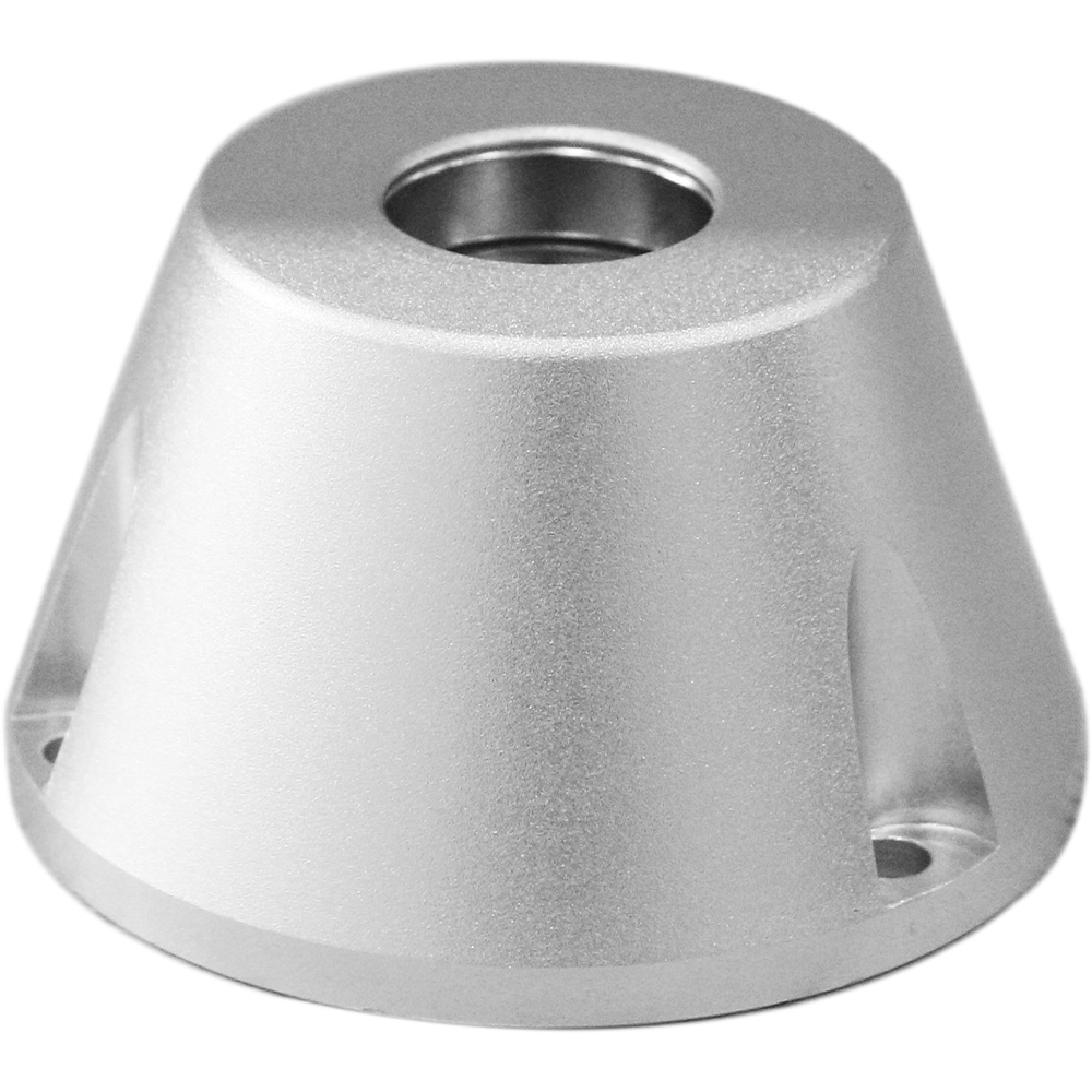 Ein silbernes, kegelförmiges Bauteil mit einer Öffnung an der Spitze und kleinen Aussparungen an der Basis.