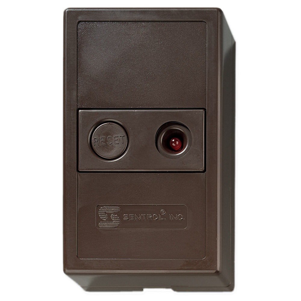 Braunes, rechteckiges Gerät mit einem Reset-Knopf und einer roten Leuchte, beschriftet mit "Sentrol, Inc."