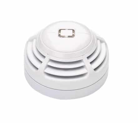 Ein weißer Rauchmelder mit Lüftungsschlitzen und einer rechteckigen Taste in der Mitte.