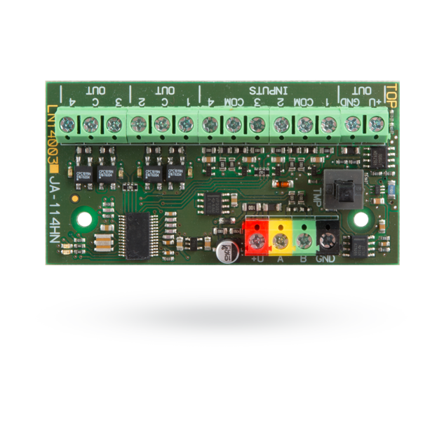Eine grüne Leiterplatte mit verschiedenen elektronischen Komponenten, darunter Anschlussklemmenleiste, Kondensatoren und Widerstände, sowie farbige Anschlussmarkierungen für +U, A, B und GND.