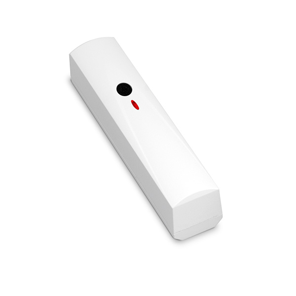 Ein weißes rechteckiges Gerät mit einem schwarzen runden Knopf und einem roten ovalen Knopf auf der Oberseite.