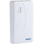 Ein weißes rechteckiges Gerät mit der Aufschrift "tyco" unten rechts. Es zeigt Symbole und Leuchtanzeigen auf der Vorderseite an.