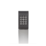 Ein schwarzes Tastenfeld mit numerischen Tasten und den Buchstaben A und B, in der Mitte einer weißen Oberfläche mit Spiegelung platziert.