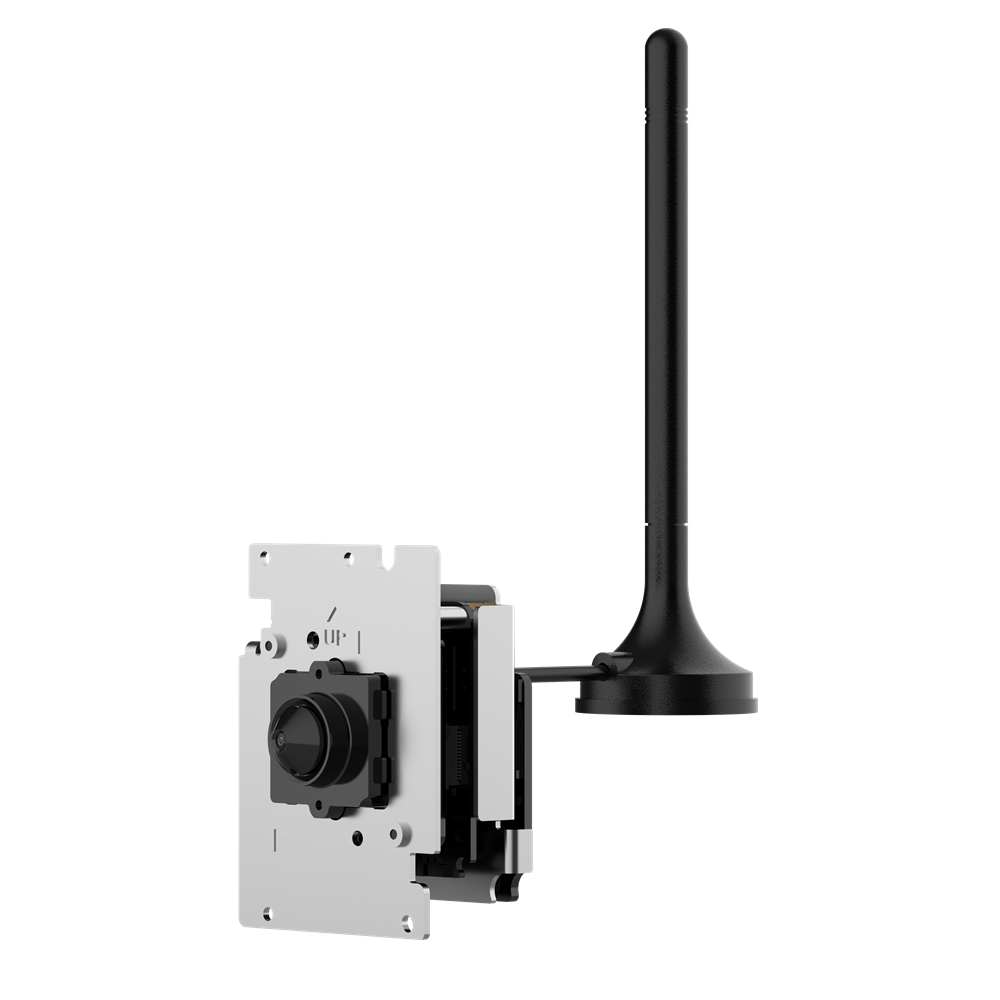 Ein technisches Gerät mit einer Kamera auf einer weißen Platte und einer langen schwarzen Antenne an der Seite.