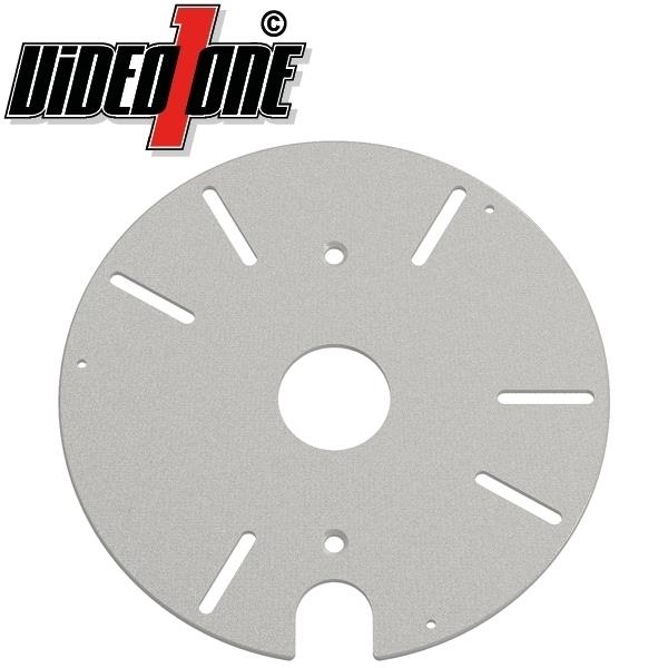 Silberne, runde Metallplatte mit einem zentralen Loch und mehreren Schlitzen, darunter das Vide One Logo in der oberen linken Ecke.