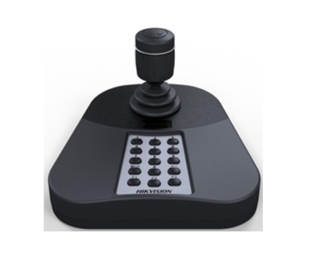 Ein schwarzer Joystick mit numerischen Tasten auf einer rechteckigen Basis mit abgerundeten Ecken.