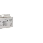 Ein silberner Netzwerk-Konverter mit mehreren Anschlüssen und der Aufschrift "comnet Communication Networks".