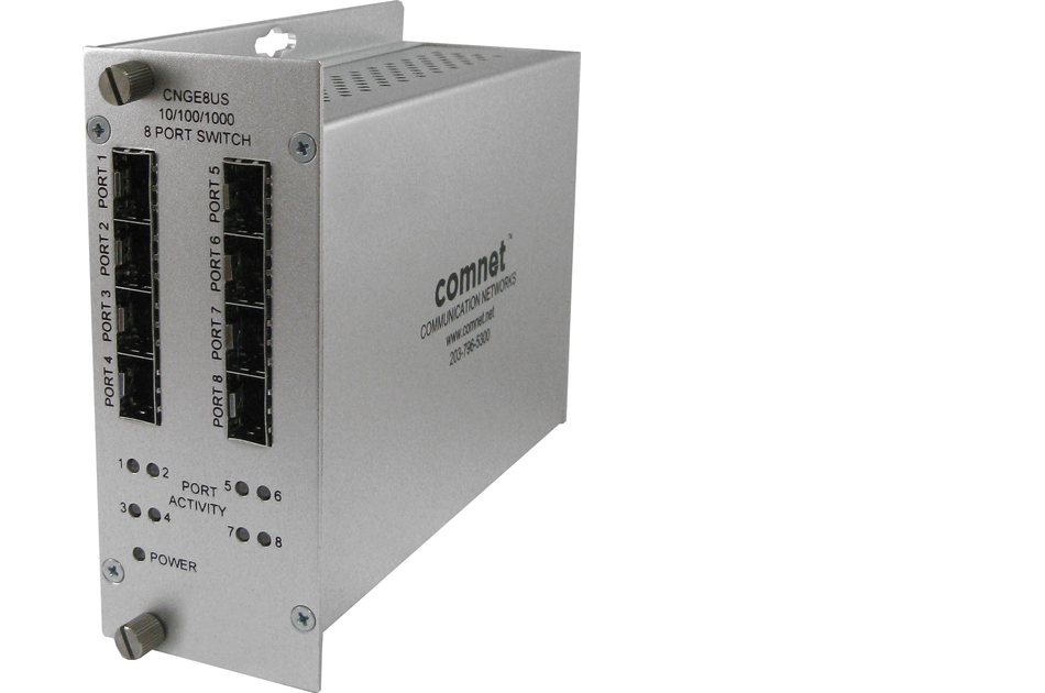 Ein silberner 8-Port-Gigabit-Switch von Comnet mit mehreren Ethernet-Anschlüssen und Statusanzeigen.