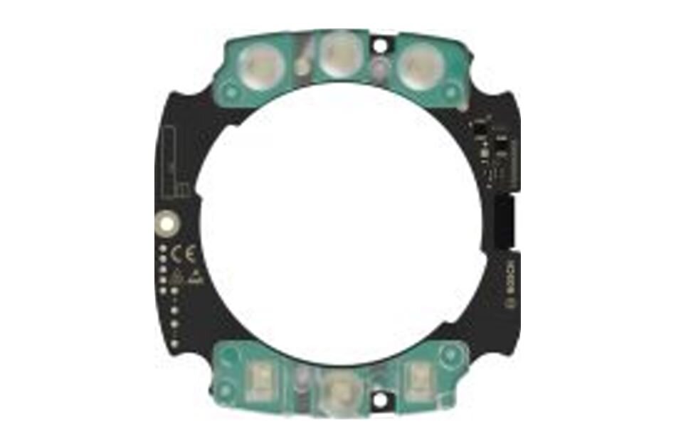 Elektronisches Bauteil in runder Form mit mehreren Schaltkreisen und symmetrischen Bauteilen auf schwarzem Hintergrund.