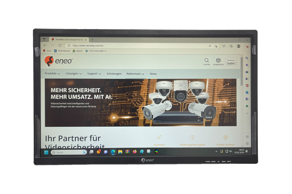 Bildschirm zeigt eine Webseite von eneo über Videosicherheit mit Bildern von Kameras und Text über Sicherheit und Umsatzsteigerung.