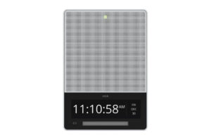 Ein rechteckiger digitaler Wecker mit grauem Lautsprecher und digitaler Uhrzeit 11:10:58 AM, Datum Freitag 30. Dezember.