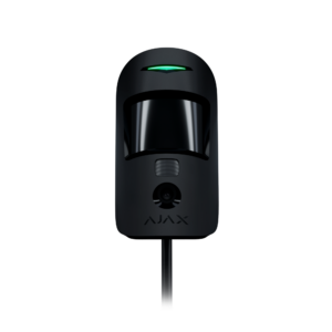 Schwarzer Sensor mit gewölbtem Glas, darunter ein kleines Objektiv und eine leuchtende grüne Anzeige auf schwarzem Hintergrund.
