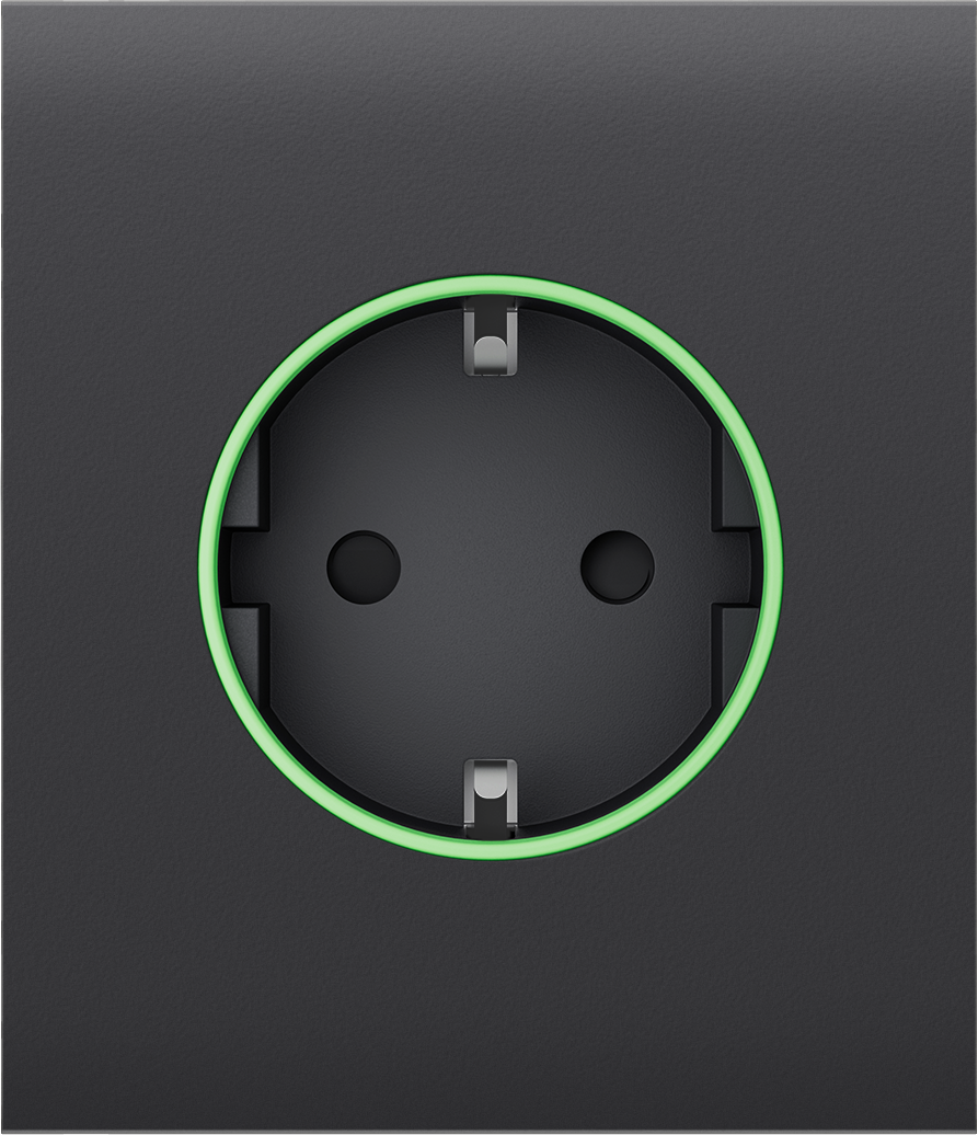 Schwarze Steckdose mit grünem Leuchtring.