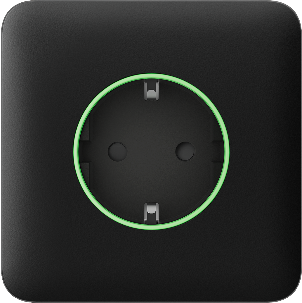 Eine schwarze Steckdose mit grünem Ring um die Öffnung.