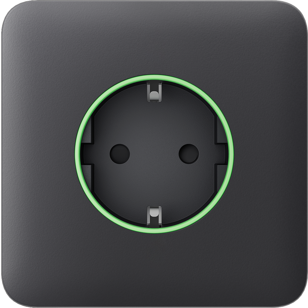 Eine schwarze Steckdose mit grünem Ring um die Buchse.