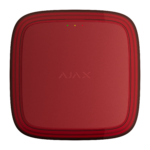 Rotes, quadratisches Gerät mit abgerundeten Ecken und zwei kleinen Lichtern oben; der Schriftzug "AJAX" ist in der Mitte sichtbar.