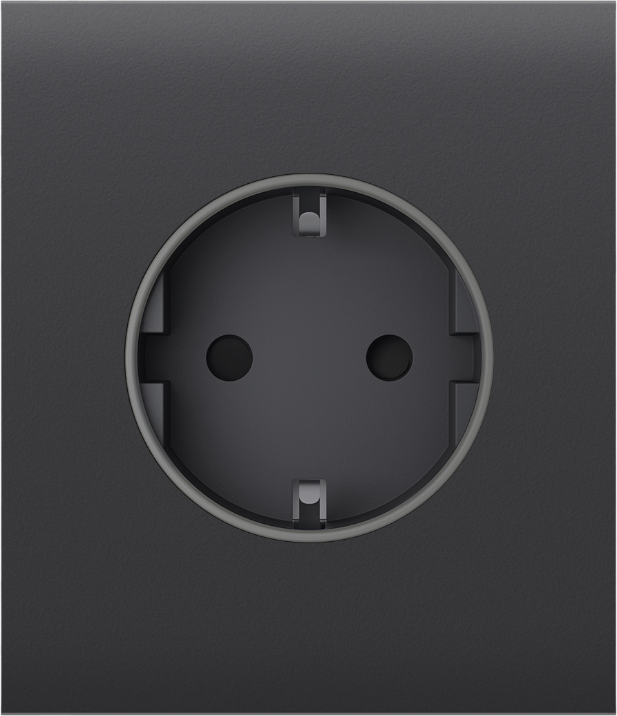 Eine schwarze Steckdose in Nahaufnahme mit runder Form.
