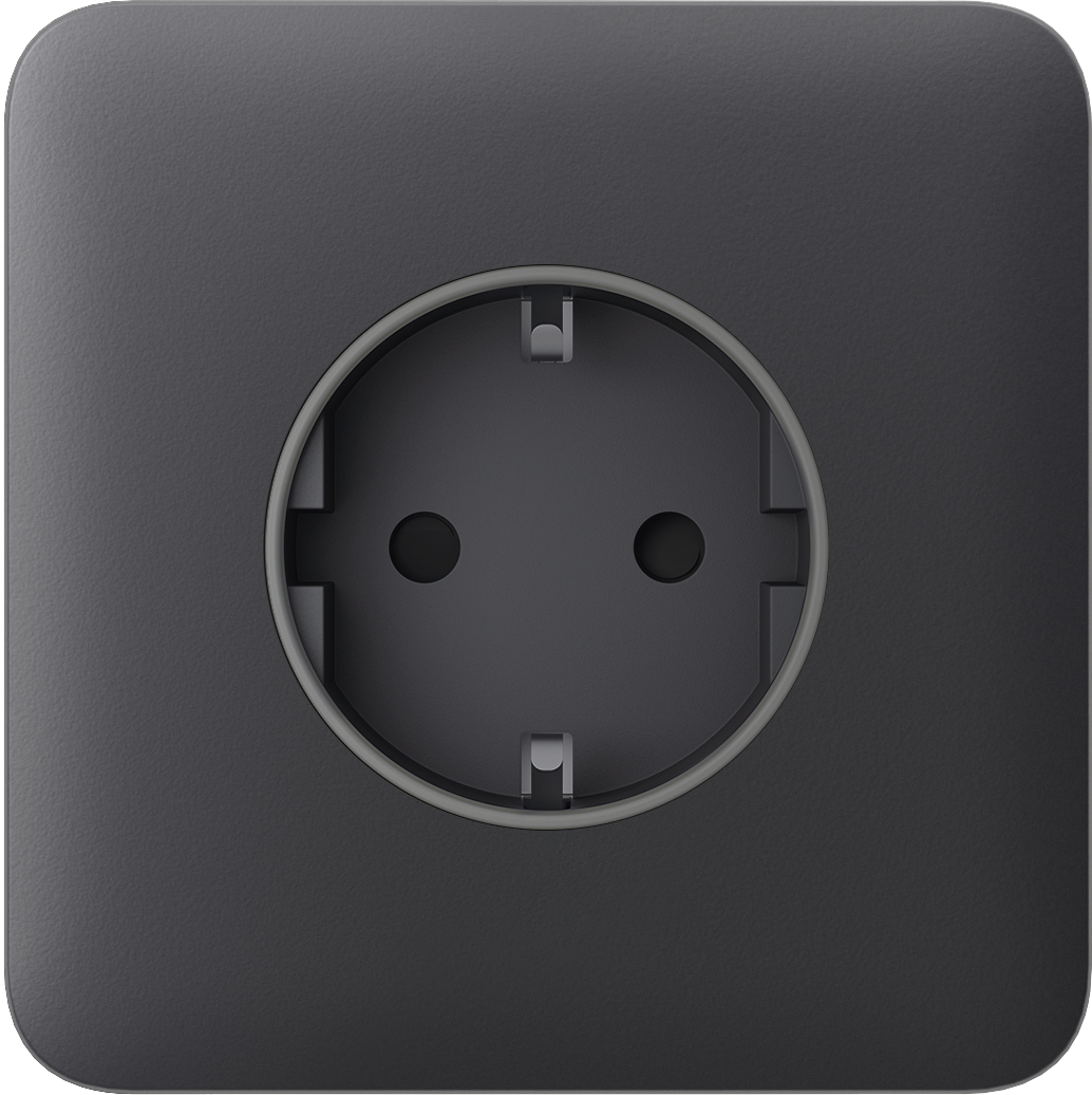 Schwarze Steckdose in Nahaufnahme mit abgerundeten Ecken.