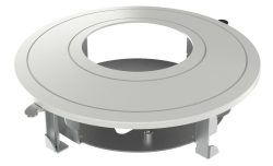 Rundes silbernes Bauteil mit einem großen Loch in der Mitte, umgeben von einem metallischen Ring, das auf einem Gestell montiert ist.