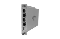 Ein silberfarbener Medienkonverter von ComNet mit mehreren Ports und LED-Anzeigen.