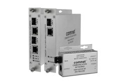 Drei silberne Medienkonverter von ComNet, mit Ports und Beschriftungen auf der Vorderseite.
